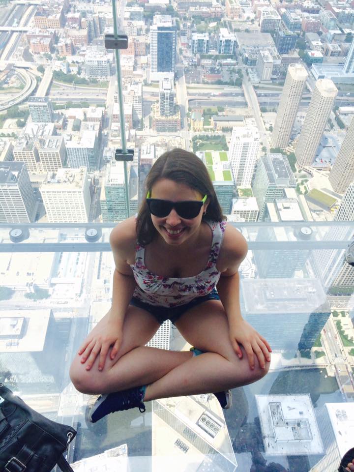 [Image is me sitting on the sky box where you can see downtown Chicago below]