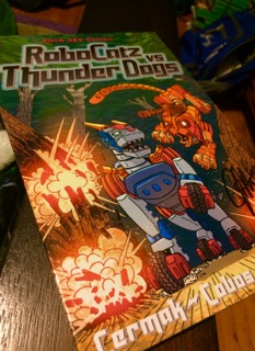 [Image is a comic cover. It says RoboCatz vs. Thunder Dogs"