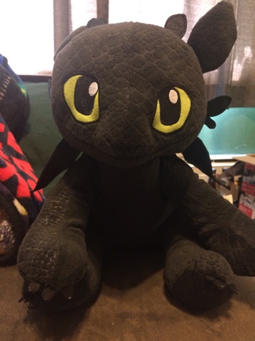 [Image shows a stuff Toothless from How to Train Your Dragon]