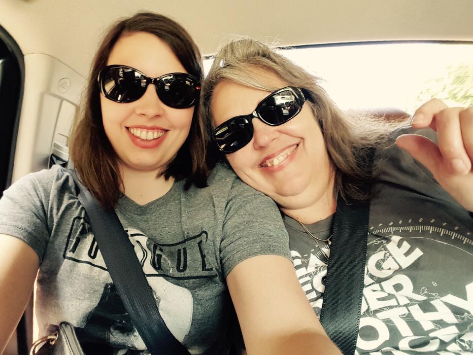 [Image is a selfie of me and my mom in a car. I'm wearing my Rogue One t-shirt]
