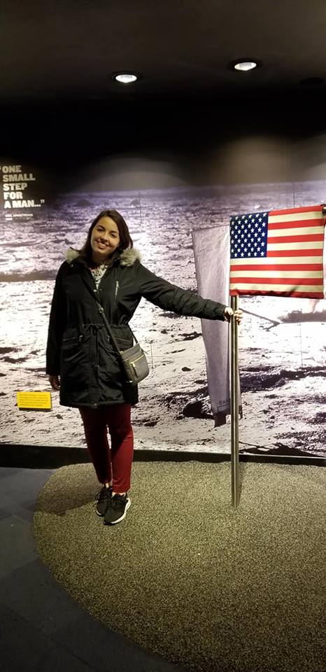 [Image is of me holding a US flag. The background is the moon]
