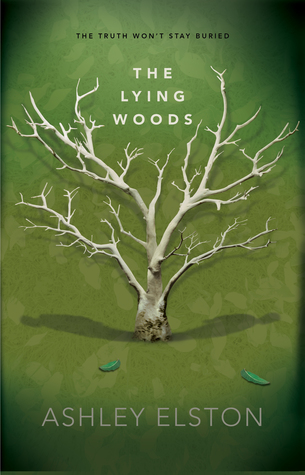 Image is a photo for the book cover, The Lying Woods by Ashley Elston. It shows a green background with a white tree branching off into many different directions. There are two singular leaves on the ground. 