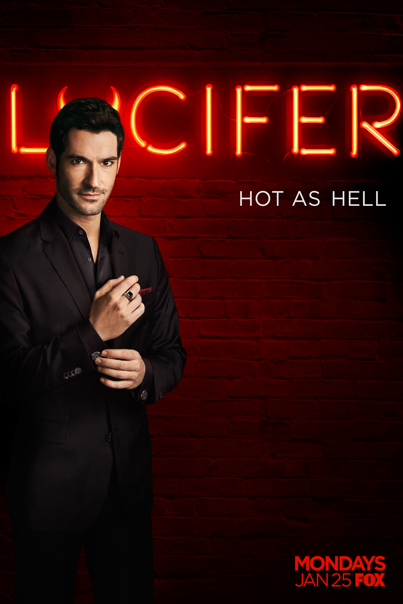 Image is a poster for the TV show, Lucifer. It shows a man adjusting his cuffs on  his suit. He has a serious face as he looks ahead. Behind him are devil horns. It says Lucifer - Hot as Hell. 