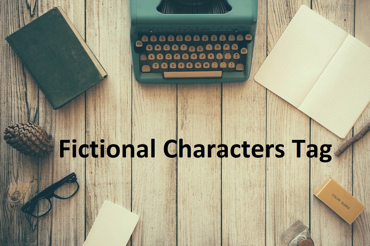 Image is a photo of a type writer and journals with a wood board background. It says in the middle: Fictional Characters Tag