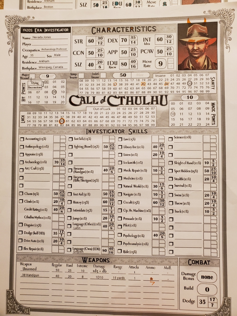 Image is a photo of a Call of Cthulhu character sheet. The character is named Nevada Jones and he's an archaeology professor. He's from Winnipeg and it lists all his stats, lucky, and sanity. 