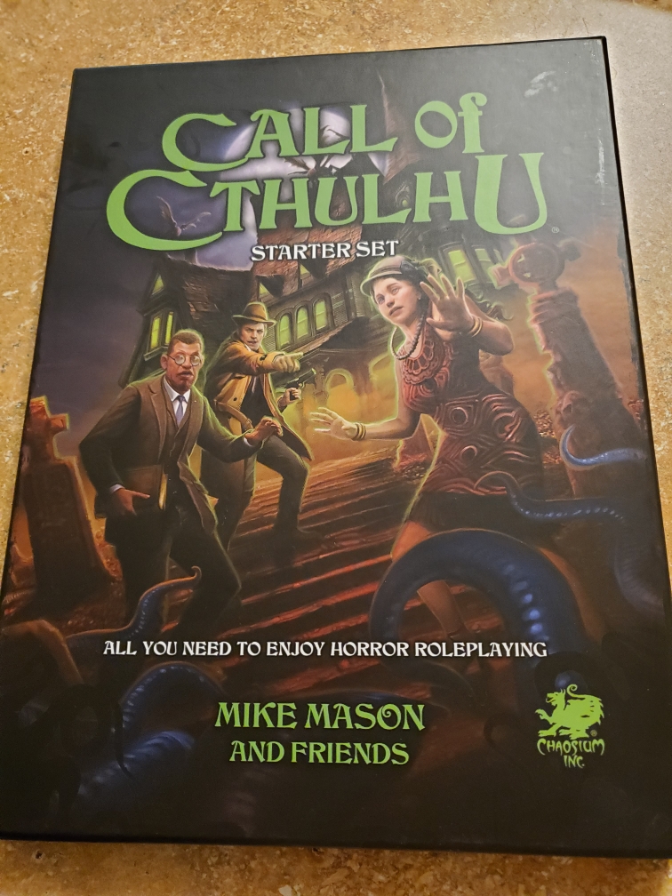 Image is a copy of the Call of Cthulhu Starter Set. On the front it says "All you need to enjoy horror roleplaying" The cover shows three people - a professor, an Indiana Jones type with a gun, and a flapper looking scared. There are tentacles coming after the three characters. 
