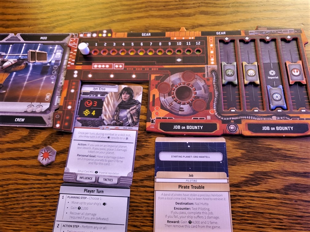 Image is a game board from the board game, Star Wars Outer Rim. On the left it shows a crew card. The middle shows gear. Below the gear is Jyn Erso's card. On the right it shows "Job or Bounty" with sliding scales representing different things. 