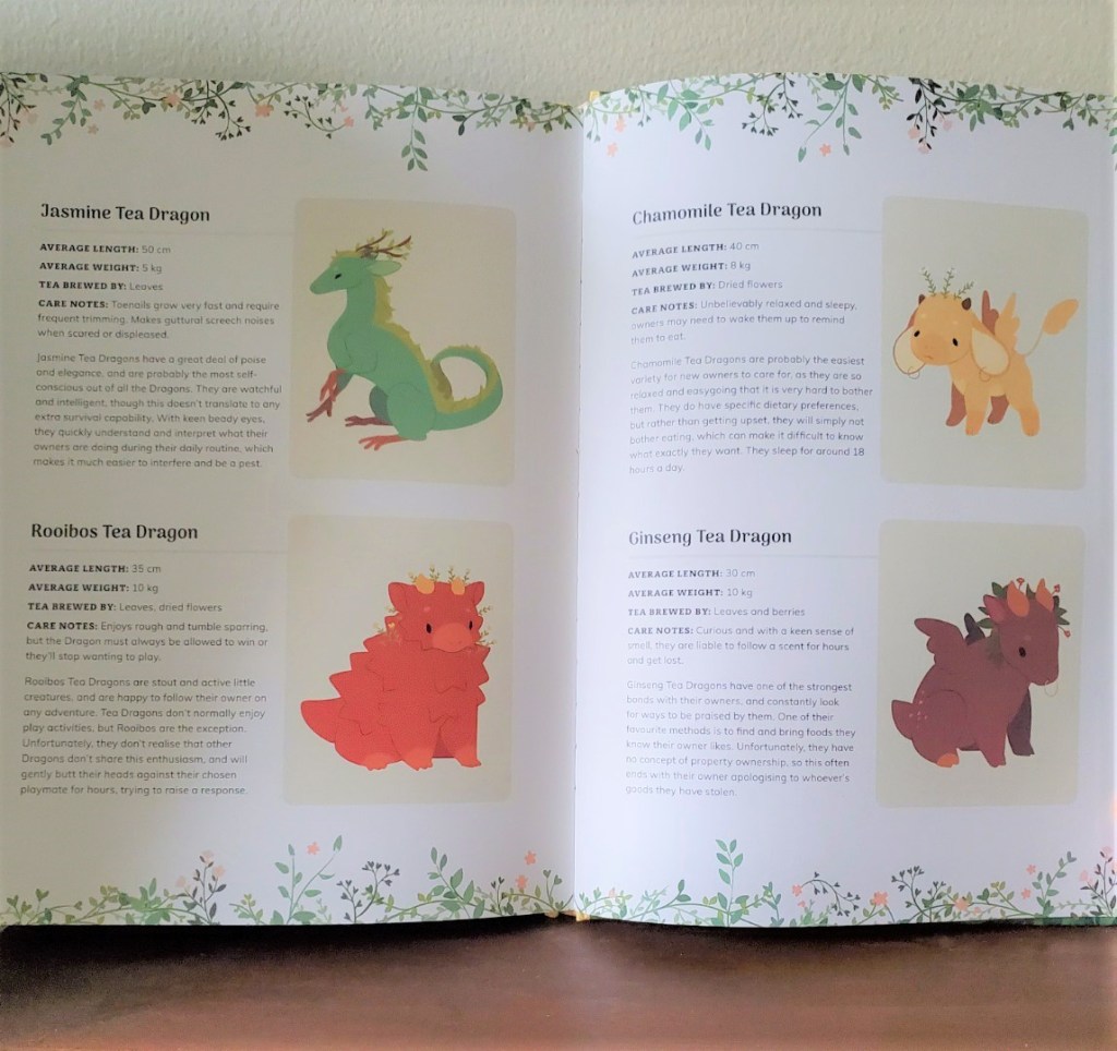 Image is a few pages from The Tea Dragon Society. It has two dragons on one page. On the left is the Jasmine Tea Dragon which is green. The Rooilbos Tea Dragon looks like a dinosaur with scales on its back. On the right, there's the Chaomomile Tea Dragon, yellow in color looks like a goat. There's the Gingseng Tea Dragon, it's a brown dragon with tiny wings. 