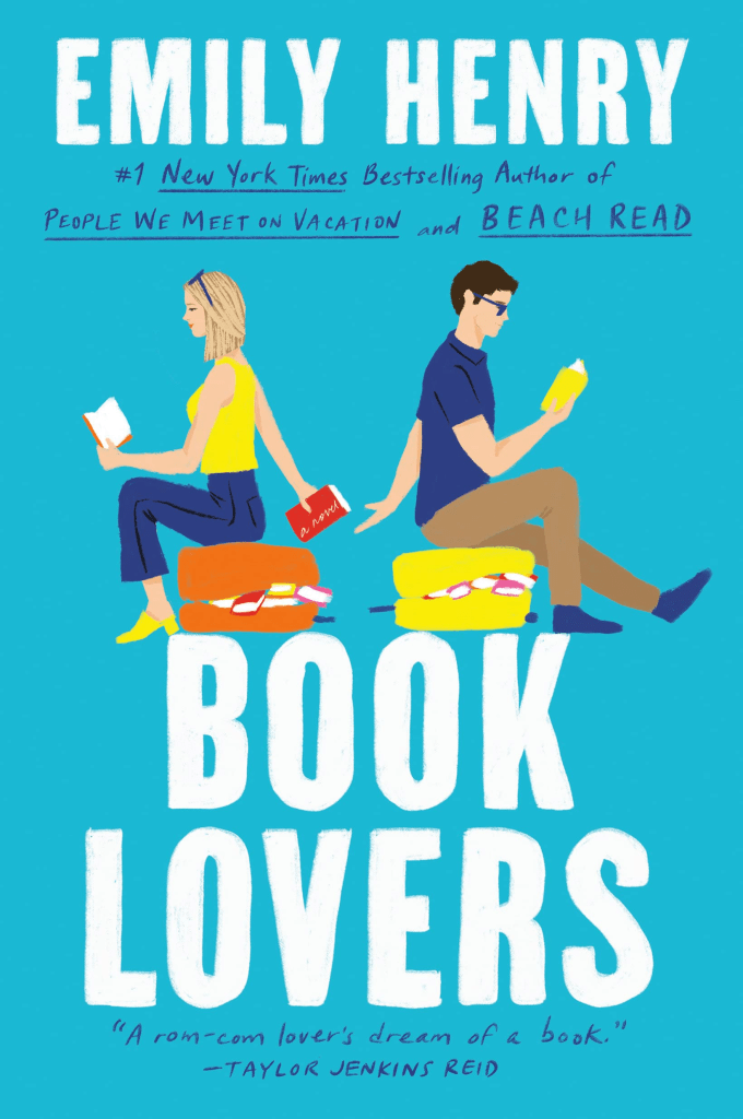[Image is a book cover. Emily Henry is the author listed at the top of the book.  It shows two people sitting on cushions reading a book. The woman is on the left handing a book to the man on the right. He's reaching out for it. Underneath it says Book Lovers as the title of the book.]