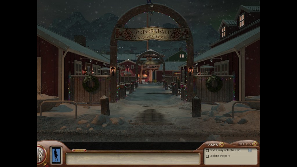 Image is a screenshot of a town. It shows these barn like buildings with an arch featuring a banner. It's dark out with light snow falling in the background. It looks like it's near the holidays. There's also an aura of darkness to the image.  