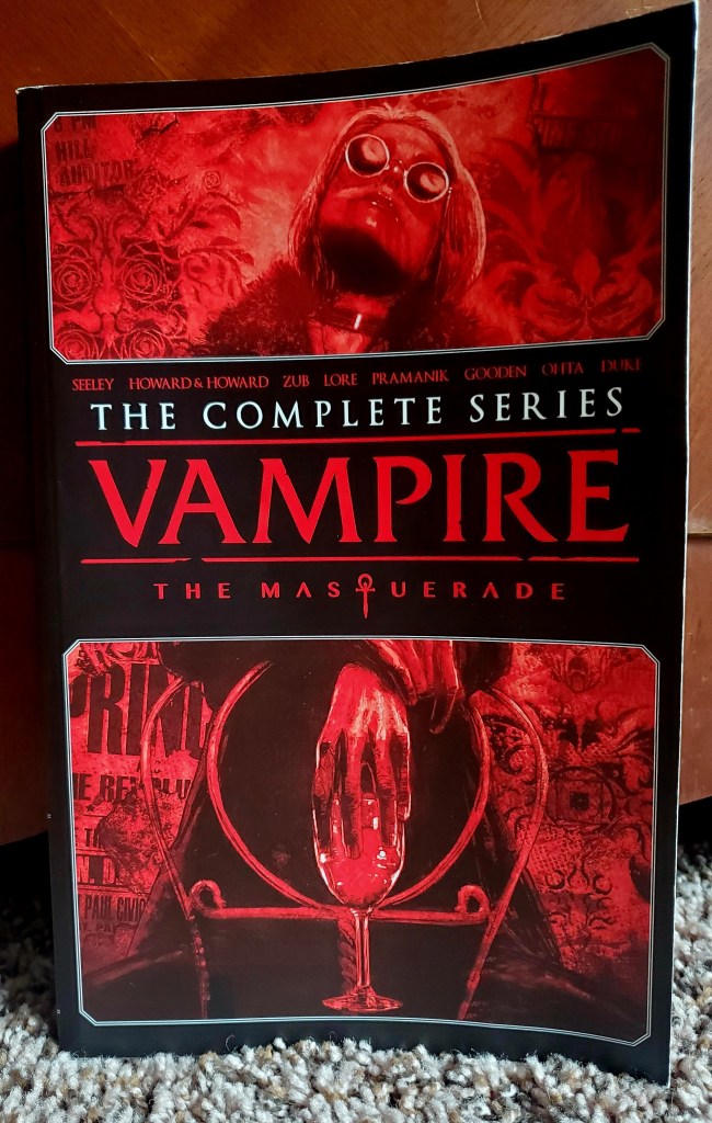 Image is a graphic novel cover for The Complete Series Vampire The Masquerade. It shows a woman with sunglasses holding a wine glass presumably filled with blood. 