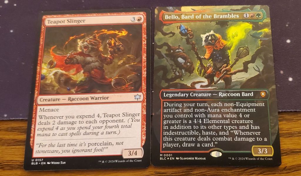 Image is a photo of two Magic cards. The first is Teapot Slinger, a Racoon Warrior. The second is Bello, Bard of the Brambles. 